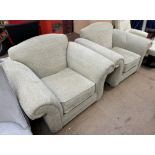 A pair of upholstered armchairs