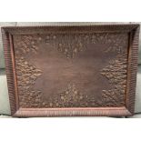 A tray of rectangular form carved with thistles