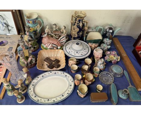 A porcelain chicken and basket together with pottery figures, Hummel figures, Royal Doulton character jugs, chrome and potter