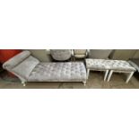 An upholstered day bed with a shaped back and button back upholstery on cabriole legs together with