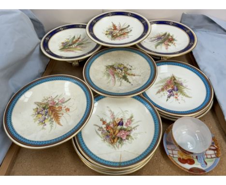 A Royal Worcester part dessert set together with other tazzas painted with sprays of garden flowers 
