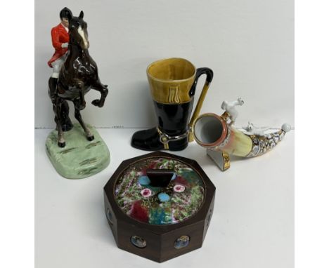 A Beswick model of a huntsman on a rearing horse Number 868, together with a horn mounted with hounds, a Sylvac boot mug, and