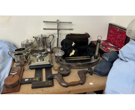 An electroplated four piece tea service together with an aeroplane lighter, teak toast rack, set squares, spirit levels, dril