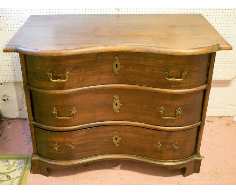 COMMODE, late 18th/early 19th century Continental birch of inverted serpentine outline containing three drawers on later brac