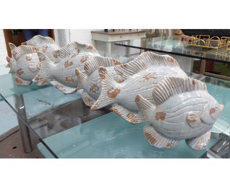 CERAMIC FISH, a set of six pale blue antiqued free standing in two sized, 37cm W and 26cm W respectively. (6)