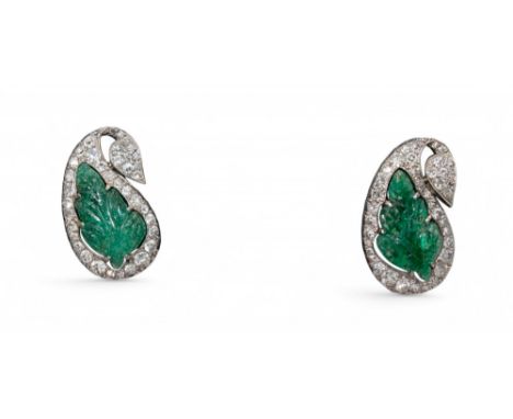 Art Deco Circa 1920 A pair of Mughal-style carved emerald and diamond earrings. Each emerald carved in the form of a leaf wit