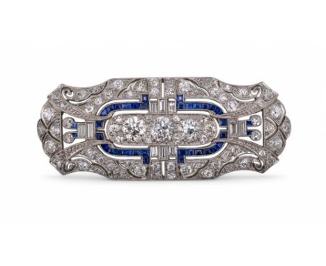 Art Deco, circa 1925 A fine sapphire and diamond plaque brooch, of architectural design, set throughout with baguette and bri