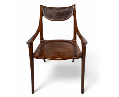 Keno Brothers (American, Contemporary)&nbsp;A slope arm chair&nbsp;in mahogany with hand-woven cane back. With a 'Keno Brothe