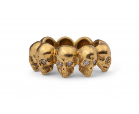 Italian Circa 1980s An 18 carat yellow gold and brilliant cut diamond skull ring  Ring size: M Weight: Approximately 10.16 gr