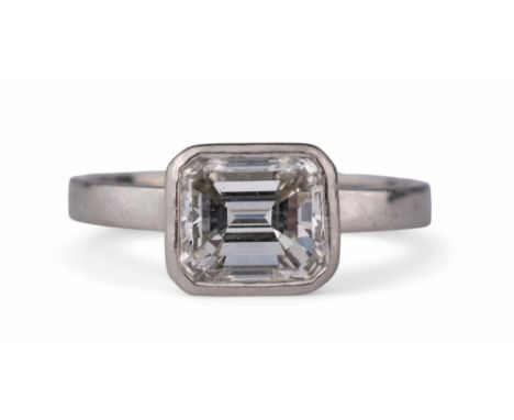 British c.1970 A fine emerald cut diamond single stone ring The diamond weighing 1.91 carats, and graded F-G colour, VS1 clar