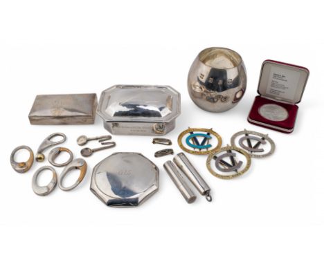 A group of silver items To include: [a] A United States silver dollar contained in a DeWitt Ross and Stevens box. [b] Two sma