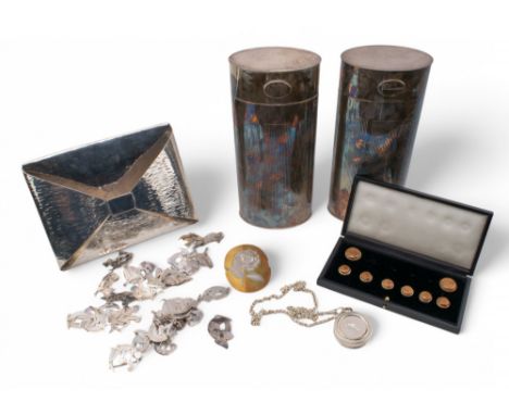 To include: [a] A pair of cartouche-shaped silver humidors [b] A set of &nbsp;two large and six smaller leather and silver bu