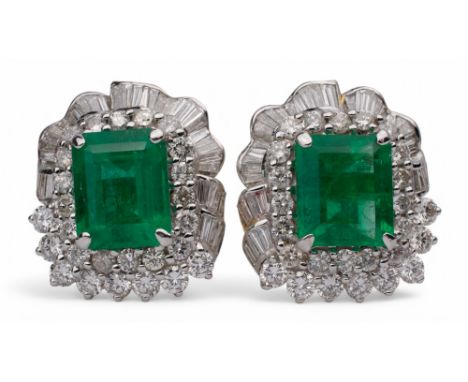 South East AsianCirca 1990sAn impressive pair of emerald and diamond cluster earrings. Each set to the centre with a rectangu