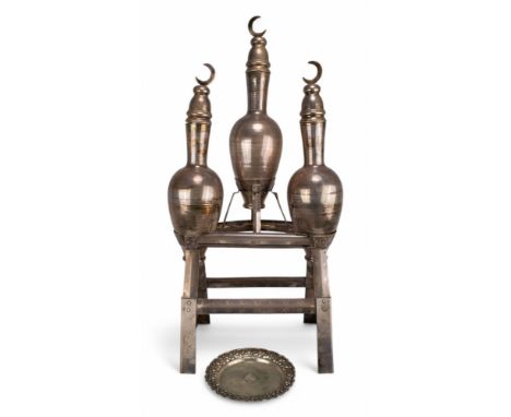 Middle Eastern A set of three amphoras with half moon lids, on a stand. The amphoras sterling silver, with 'Fitaihi' hallmark