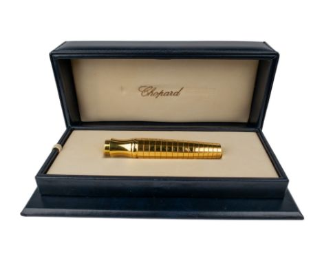 ChopardSwissCirca 2000A Plume Bouchon Cube gold plated&nbsp;twister fountain pen. The nib in 81k gold.In the original leather