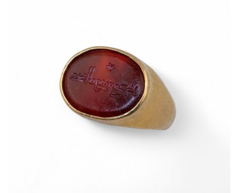 A yellow gold and carnelian intaglio ring with inscription Ring size: J-K Total weight: Approximately 6.49 grams