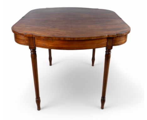 Regency An unusually shaped fold-over card table, in mahogany with ebony and satinwood stringing  From the Fane Collection  D