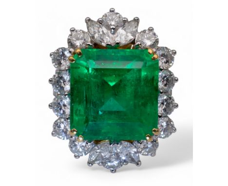 South East AsianCirca 1990s&nbsp;An impressive emerald and diamond dress ring. Set to the centre with a rectangular cut corne