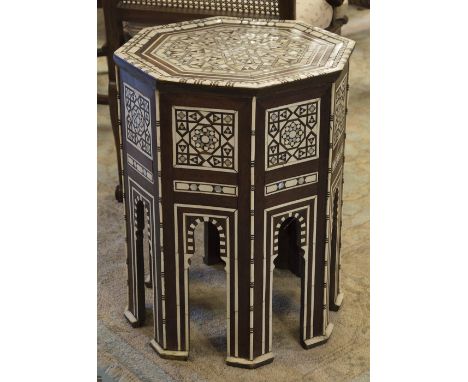 LAMP TABLE, early 20th century Moorish hardwood, bone, mother of pearl and ebony inlaid with octagonal top on mihrab arched b