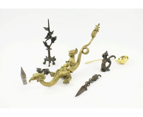 GILT METAL DRAGON MOUNT, 49cm L, together with four various decorative bronze curio items. (5)