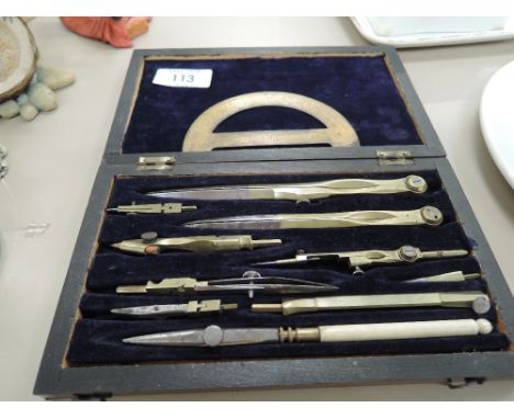 A vintage mathematical set in wooden case