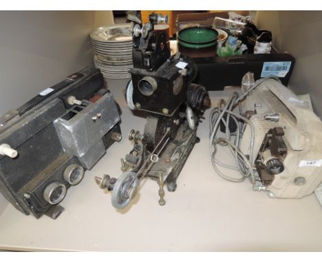 A vintage Pathescope projector and other projectors and film etc