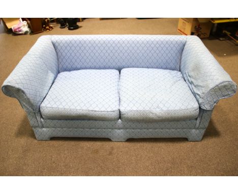A contemporary sofa bed. Upholstered in blue fabric with four cushions, H69cm x W175cm x D95cm