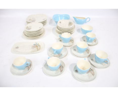 A mid century J&G Meakin 'Rock Fern' two-tone tea and dinner service. Including eight cups and saucers, a gravy boat, etc. Ma