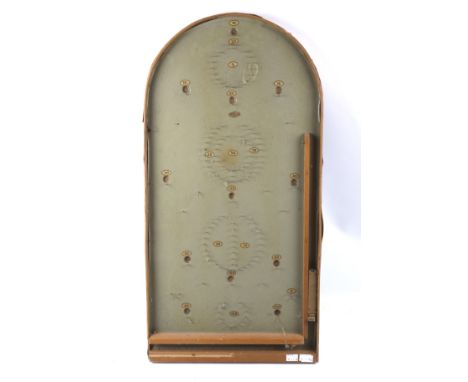 A vintage bagatelle board. With a wooden frame, H77cm
