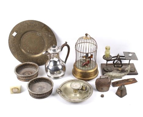 An assortment of collectables. Including a pair of silver plated coasters, candlestick and snuffer, set of scales, engraved b