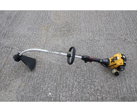 A JCB strimmer. With a M25 engine