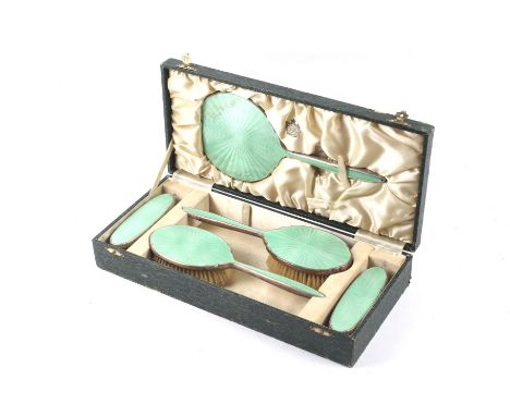 A ladies green enamel vanity set (boxed). Retailer label W. R. Bullen Ltd, Norwich', comb missing.