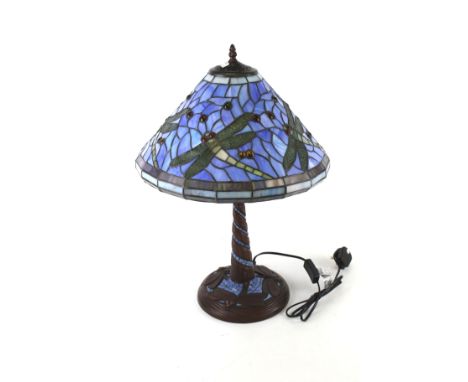 A Tiffany style table lamp. With a 'dragonfly' leaded glass shade, H55cm