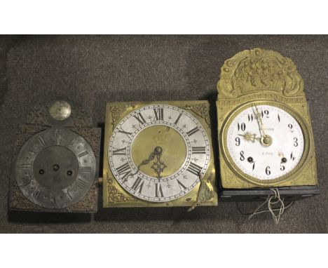 Three grandfather and longcase clock movements. All with brass frames, one with a white enamel dial with Arabic numerals, H40