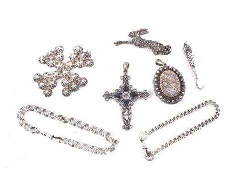 A collection of white metal jewellery. Including a marcasite 'hare' brooch stamped 925, an oval locket, button hook, watch ch