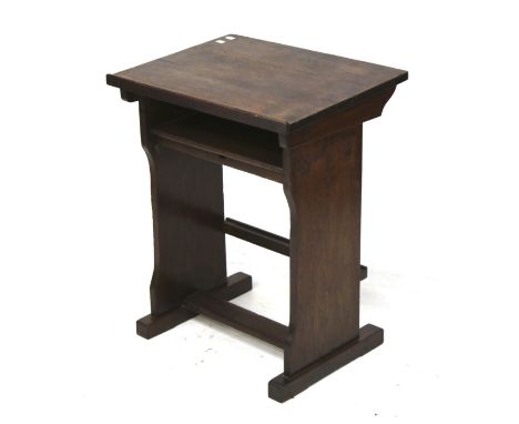 A vintage oak lectern. With a single drawer and shelf beneath, raised on supports united by a stretcher, H75.5cm x W61cm x D4