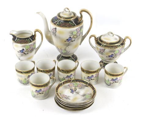 A early 20th century Japanese eggshell six piece tea service. Decorated with birds and blossoms, H18cm