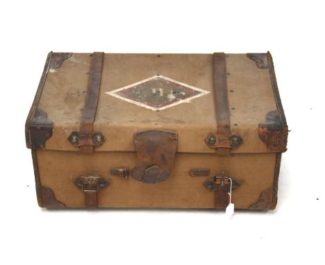 A vintage leather bound trunk. The canvas top stamped ' J S Wood T.H.S.', H35cm x W77cm x D48cm