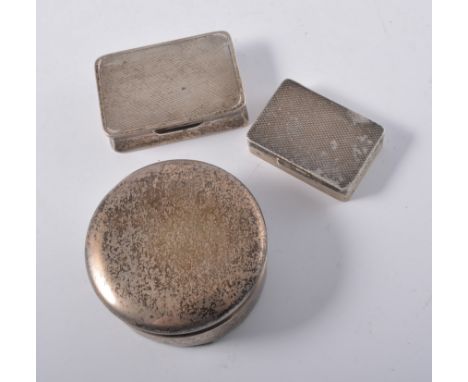 Rectangular silver snuff box, Birmingham 1953, engine-turned, 5cm, another Birmingham 1974, 4cm and a circular powder box, (3