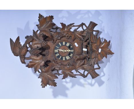 Black Forest Cuckoo clock, circa 1920, approximately 63cm.
