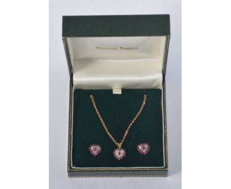 9ct hallmarked gold earring and pendant set, each with fourteen ruby coloured stones and diamond points in heart-shaped desig