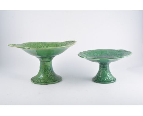 Collection of Victorian green glazed leaf-moulded pottery, plates, bowls and comports, quantity.