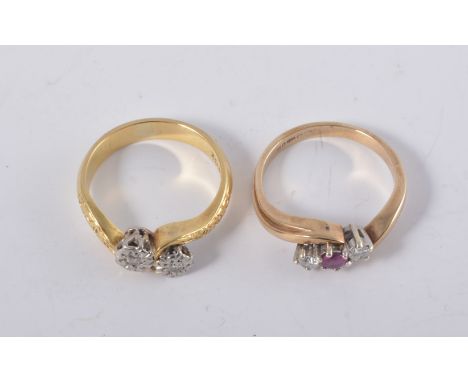 Two crossover design rings, yellow metal cross-over ring illusion set with two diamond points, stamped 18ct, approximate weig