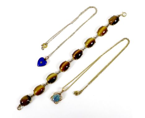 A 9ct gold and tiger's eye cabochon bracelet, 19cm, 19.4g, together with a 9ct gold mounted opal pendant, 2.2g, with gilt met