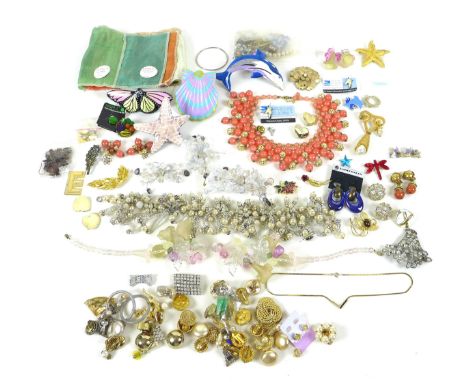 A large selection of costume jewellery, mostly 20th century, including an art glass bead necklace, likely Murano, a pink ston