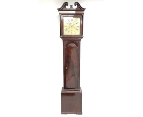 Early 19th century figured mahogany longcase clock, scrolled and moulded swan neck pediment with carved flower head roundels 