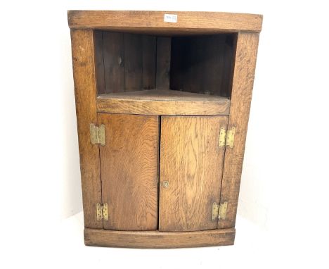 Early 20th century oak wall hanging corner cupboard, two doors enclosing shaped shelfDimensions: Height:&nbsp;88cm&nbsp; Leng