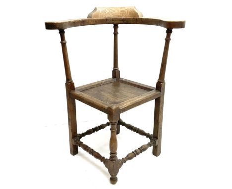 19th century elm and oak corner chair, scrolling rail into arms, bobbin turned supports and stretchersDimensions: Length/Widt