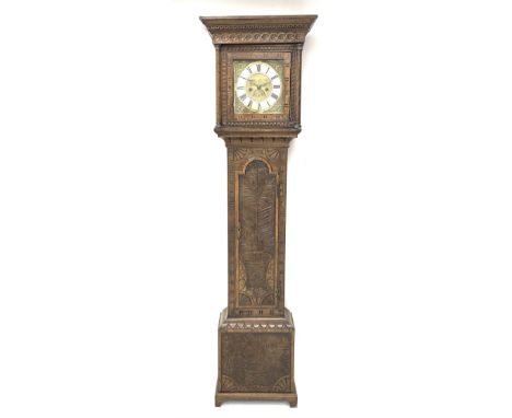 19th century carved oak longcase clock, projecting cornice over guilloche carved frieze, square brass dial with silvered Roma