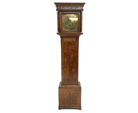 Early 19th century oak longcase clock, projecting cornice over frieze painted with scrolls, square glazed door enclosed by pl